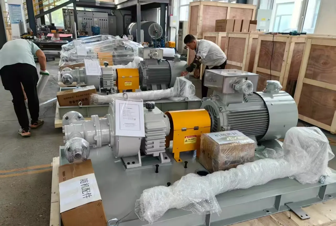 Pump sets being wrapped and crated for shipment