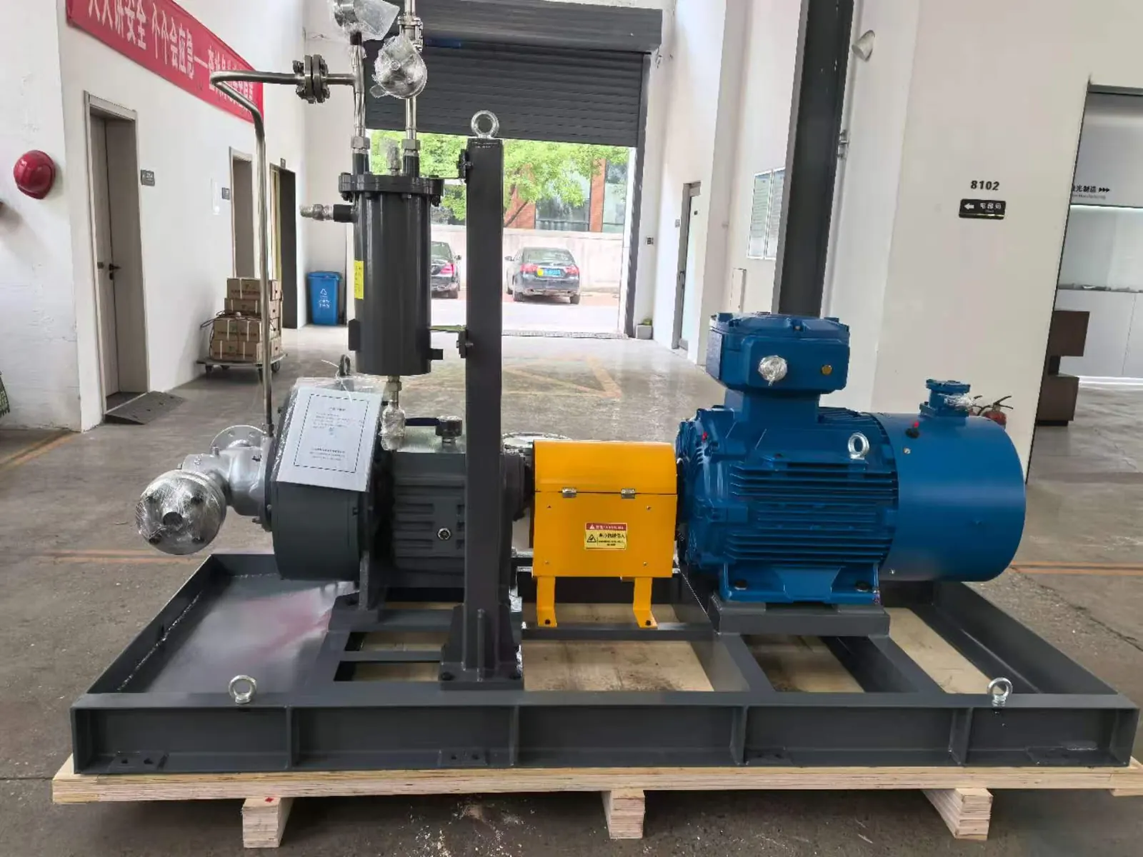 Pump skid with explosion-proof motor and seal flush system